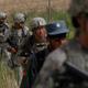 U.S. Army and Afghan police patrol in Afghanistan, June 2010. (Chris Hondros/Getty Images)
